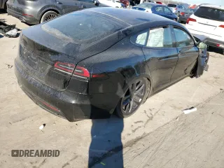 2023 Tesla Model S with VIN 5YJSA1E5XPF519570, listed as a Copart auction lot 80573863 with Not provided miles and Salvage title. Bid and sale history available at DreamBid. Image 3.