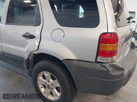 2006 Ford Escape XLT with VIN 1FMCU93126KC12711, listed as a IAAI auction lot 42659618 with 180,611 mi miles and . Bid and sale history available at DreamBid. Image 6.