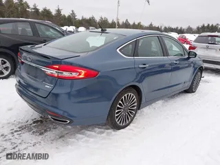 2018 Ford Fusion Titanium with VIN 3FA6P0D91JR219894, listed as a IAAI auction lot 41544449 with 100,406 mi miles. Bid and sale history available at carsss.com. Image 4.