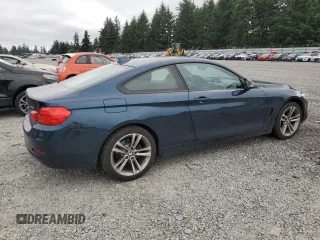 2014 BMW 4 Series 428i xDrive with VIN WBA3N9C55EF721832, listed as a Copart auction lot 62958455 with 118,168 mi miles and Salvage title. Bid and sale history available at DreamBid. Image 3.