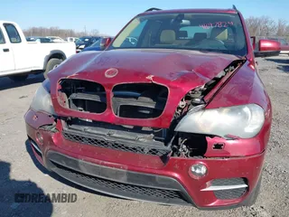 2011 BMW X5 35i with VIN 5UXZV4C52BL413125, listed as a IAAI auction lot 41697824 with 136,828 mi miles. Bid and sale history available at carsss.com. Image 6.