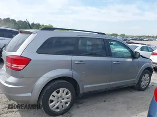 2017 Dodge Journey SE z VIN 3C4PDCAB0HT694918, wystawiony jako IAAI lot #42010594 z przebiegiem 135 432 mil mil oraz . Historia ofert i sprzedaży dostępna na DreamBid. Obrazek 13.