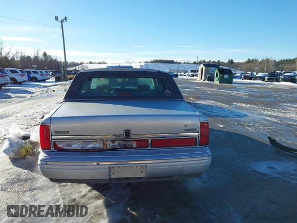 1997 Lincoln Town Car Cartier with VIN 1LNLM83W9VY661126, listed as a IAAI auction lot 41456847 with 160,710 mi miles and . Bid and sale history available at DreamBid. Image 16.