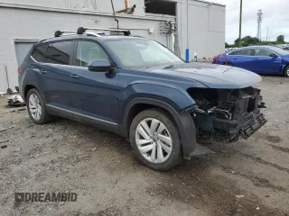2021 Volkswagen Atlas SEL with VIN 1V2BR2CA8MC576209, listed as a Copart auction lot 57520615 with 63,575 mi miles and Salvage title. Bid and sale history available at DreamBid. Image 4.