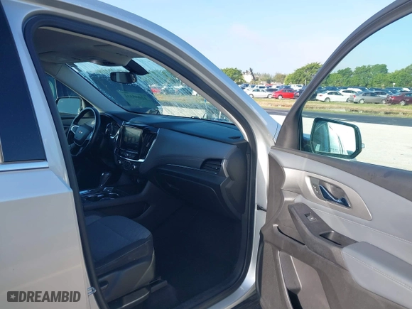 2018 Chevrolet Traverse LT Cloth with VIN 1GNERGKW8JJ147739, listed as a IAAI auction lot 42005332 with 104,373 mi miles. Bid and sale history available at carsss.com. Image 5.