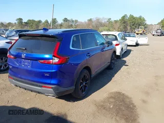 2023 Honda CR-V Sport Touring with VIN 5J6RS6H96PL001826, listed as a IAAI auction lot 42098381 with 13,813 mi miles and . Bid and sale history available at DreamBid. Image 4.