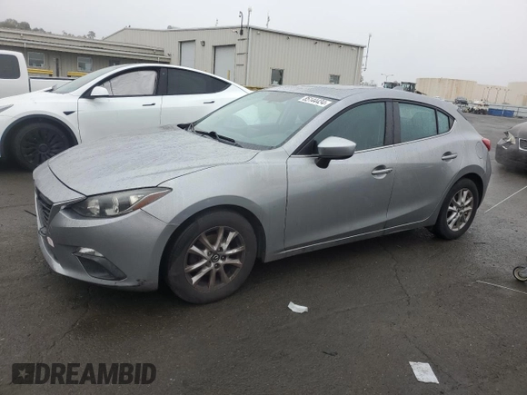 2014 Mazda 3 i Grand Touring with VIN JM1BM1M74E1106463, listed as a Copart auction lot 85144434 with 122,729 mi miles and Salvage Title. Bid and sale history available at DreamBid. Image 1.