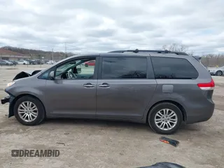 2014 Toyota Sienna XLE with VIN 5TDYK3DC0ES422700, listed as a IAAI auction lot 42049181 with 147,498 mi miles. Bid and sale history available at carsss.com. Image 14.