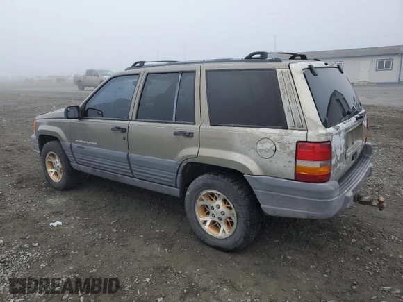 1997 Jeep Grand Cherokee Laredo with VIN 1J4GZ58Y5VC637350, listed as a Copart auction lot 77405444 with 182,482 mi miles and Clean Title. Bid and sale history available at carsss.com. Image 2.