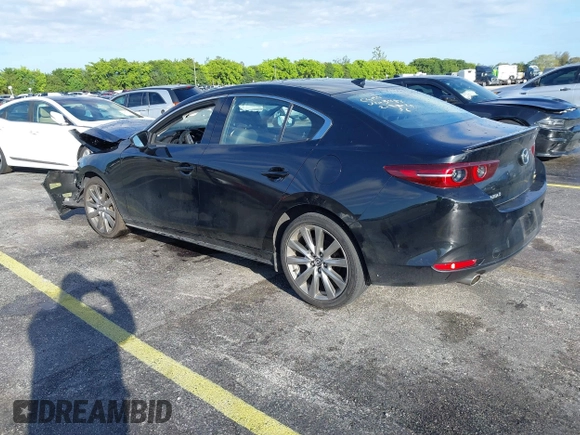 2021 Mazda 3 Premium with VIN JM1BPADL7M1303484, listed as a IAAI auction lot 41666785 with 34,476 mi miles and . Bid and sale history available at DreamBid. Image 3.