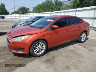 2018 Ford Focus SE z VIN 1FADP3FE1JL310584, wystawiony jako Copart lot #58739185 z przebiegiem 93 348 mil mil oraz Szkoda całkowita • Salvage title. Historia ofert i sprzedaży dostępna na DreamBid. Obrazek 1.