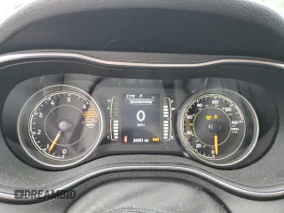 2021 Jeep Cherokee Altitude z VIN 1C4PJLLB2MD169574, wystawiony jako Copart lot #57119285 z przebiegiem 24 301 mil mil oraz Szkoda całkowita • Salvage title. Historia ofert i sprzedaży dostępna na DreamBid. Obrazek 9.