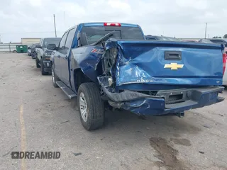 2017 Chevrolet Silverado 1500 LT with VIN 3GCUKREC8HG462719, listed as a IAAI auction lot 41940176 with 380,676 mi miles and . Bid and sale history available at DreamBid. Image 3.