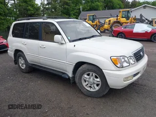 1998 Lexus LX 470 z VIN JT6HT00W9W0007768, wystawiony jako IAAI lot #42322883 z przebiegiem 227 546 mil mil oraz . Historia ofert i sprzedaży dostępna na DreamBid. Obrazek 1.