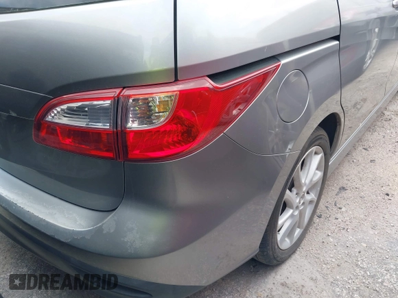 2012 Mazda 5 Grand Touring z VIN JM1CW2DL1C0126545, wystawiony jako IAAI lot #42301130 z przebiegiem 151 212 mil mil oraz . Historia ofert i sprzedaży dostępna na DreamBid. Obrazek 13.