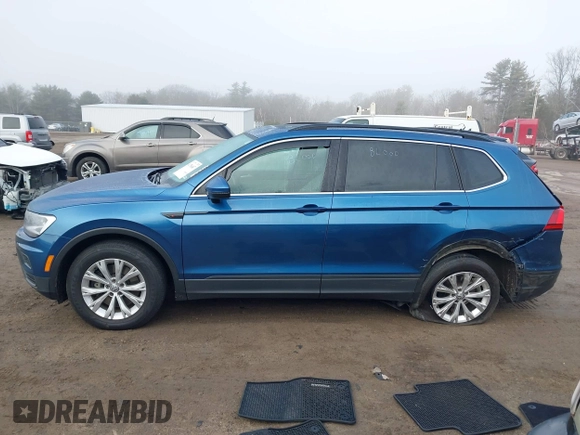 2019 Volkswagen Tiguan SE with VIN 3VV2B7AX4KM017280, listed as a IAAI auction lot 41786487 with 119,949 mi miles and . Bid and sale history available at DreamBid. Image 14.