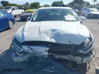 2020 Ford Fusion Hybrid Titanium with VIN 3FA6P0RU4LR182226, listed as a IAAI auction lot 41748021 with 69,234 mi miles. Bid and sale history available at carsss.com. Image 6.