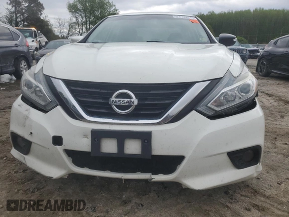2018 Nissan Altima SV with VIN 1N4AL3AP9JC177614, listed as a Copart auction lot 52033385 with 216,463 mi miles and Clean Title. Bid and sale history available at DreamBid. Image 5.