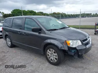 2019 Dodge Grand Caravan SE with VIN 2C4RDGBGXKR796974, listed as a IAAI auction lot 42008704 with 129,229 mi miles and . Bid and sale history available at DreamBid. Image 1.