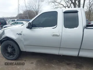 2002 Ford F-150 XL with VIN 1FTRX17212NA45843, listed as a IAAI auction lot 41575856 with 136,570 mi miles. Bid and sale history available at carsss.com. Image 14.