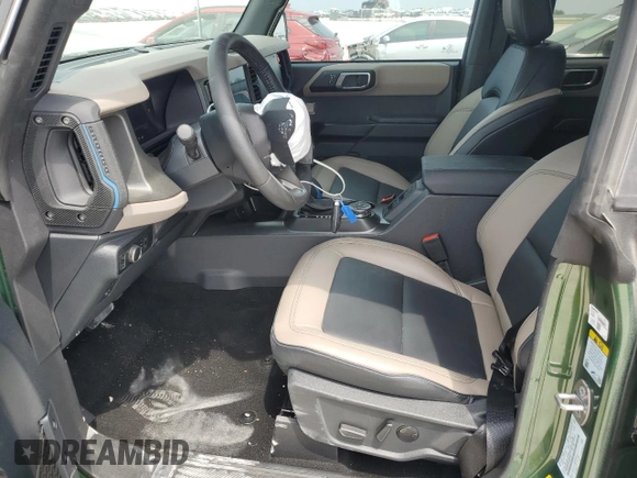 2024 Ford Bronco Wildtrak z VIN 1FMEE2BPXRLB03494, wystawiony jako Copart lot #53852225 z przebiegiem 5 166 mil mil oraz Szkoda całkowita • Salvage title. Historia ofert i sprzedaży dostępna na DreamBid. Obrazek 7.