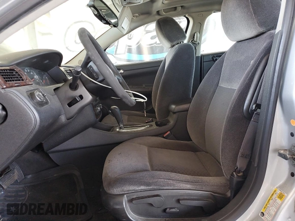 2015 Chevrolet Impala LT with VIN 2G1WB5E34F1163311, listed as a Copart auction lot 64336575 with 118,336 mi miles and Salvage title. Bid and sale history available at DreamBid. Image 7.