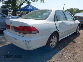 2001 Honda Accord EX z VIN 1HGCG56611A124406, wystawiony jako IAAI lot #42401266 z przebiegiem 177 917 mil mil oraz . Historia ofert i sprzedaży dostępna na DreamBid. Obrazek 6.