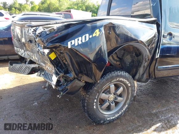 2013 Nissan Titan Pro-4X with VIN 1N6BA0EC4DN305032, listed as a IAAI auction lot 42341681 with 118,251 mi miles and . Bid and sale history available at DreamBid. Image 6.