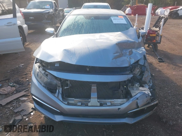 2020 Honda Civic LX z VIN 2HGFC2F60LH549739, wystawiony jako IAAI lot #40922240 z przebiegiem 127 958 mil mil oraz . Historia ofert i sprzedaży dostępna na DreamBid. Obrazek 6.