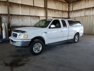 1998 Ford F-150 z VIN 1FTRX18L0WKA53124, wystawiony jako Copart lot #66466945 z przebiegiem 252 908 mil mil oraz Czysty tytuł • Clean title. Historia ofert i sprzedaży dostępna na DreamBid. Obrazek 1.