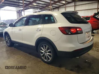 2014 Mazda CX-9 Grand Touring z VIN JM3TB3DV9E0428632, wystawiony jako Copart lot #59928885 z przebiegiem 83 697 mil mil oraz Szkoda całkowita • Salvage title. Historia ofert i sprzedaży dostępna na DreamBid. Obrazek 2.