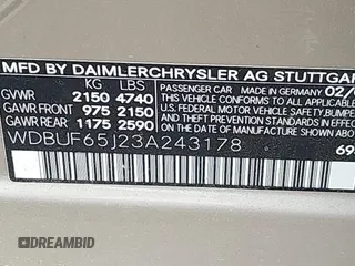 2003 Mercedes-Benz E-Class 3.2L with VIN WDBUF65J23A243178, listed as a IAAI auction lot 41974660 with 134,459 mi miles. Bid and sale history available at carsss.com. Image 9.