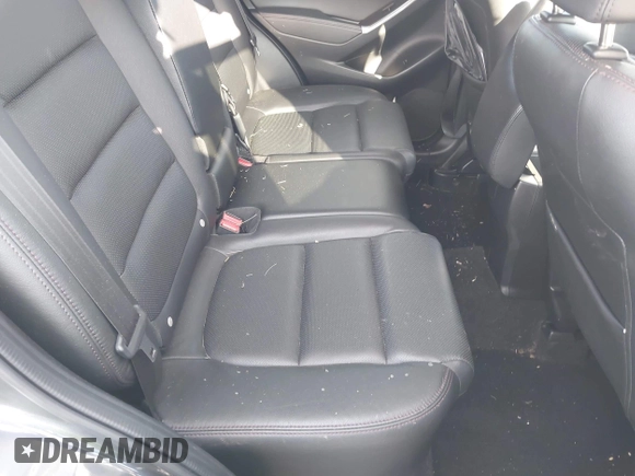 2016 Mazda CX-5 Grand Touring with VIN JM3KE4DYXG0724183, listed as a IAAI auction lot 42176009 with 152,695 mi miles and . Bid and sale history available at DreamBid. Image 8.