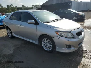 2010 Toyota Corolla with VIN 1NXBU4EE7AZ227815, listed as a Copart auction lot 61234235 with 167,828 mi miles and Salvage title. Bid and sale history available at DreamBid. Image 4.
