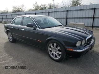 2004 Jaguar XJ with VIN SAJEA71C94SG11566, listed as a Copart auction lot 85281684 with 107,054 mi miles and Clean Title. Bid and sale history available at carsss.com. Image 4.