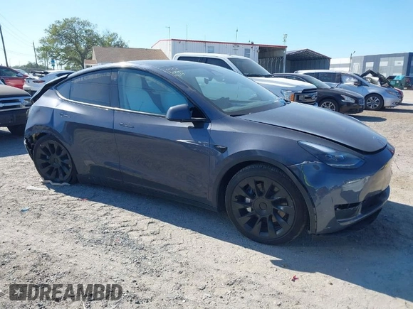 2023 Tesla Model Y Long Range with VIN 7SAYGDEE1PA203937, listed as a IAAI auction lot 41814421 with 9,138 mi miles. Bid and sale history available at carsss.com. Image 1.