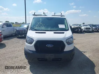 2021 Ford Transit Cargo with VIN 1FTYE1Y80MKA75151, listed as a IAAI auction lot 42577609 with 91,623 mi miles and . Bid and sale history available at DreamBid. Image 12.