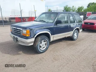 1991 Ford Explorer z VIN 1FMCU24X0MUA91155, wystawiony jako IAAI lot #42314856 z przebiegiem 75 836 mil mil oraz . Historia ofert i sprzedaży dostępna na DreamBid. Obrazek 2.