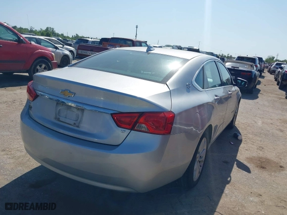2016 Chevrolet Impala LT with VIN 2G1115S33G9103539, listed as a IAAI auction lot 41998565 with 128,595 mi miles. Bid and sale history available at carsss.com. Image 4.