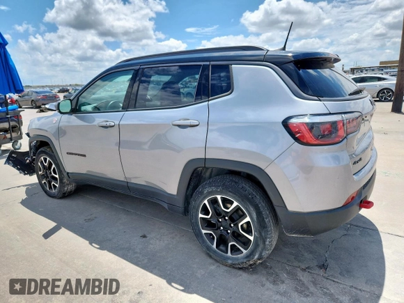 2020 Jeep Compass Trailhawk z VIN 3C4NJDDB0LT207825, wystawiony jako Copart lot #63699915 z przebiegiem 58 190 mil mil oraz Szkoda całkowita • Salvage title. Historia ofert i sprzedaży dostępna na DreamBid. Obrazek 2.