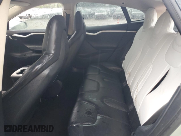 2014 Tesla Model S 60 z VIN 5YJSA1H10EFP55828, wystawiony jako Copart lot #56135145 z przebiegiem 161 317 mil mil oraz Czysty tytuł • Clean title. Historia ofert i sprzedaży dostępna na DreamBid. Obrazek 10.