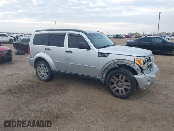 2010 Dodge Nitro SE with VIN 1D4PT2GK8AW144406, listed as a IAAI auction lot 41590691 with 165,959 mi miles and . Bid and sale history available at DreamBid. Image 1.