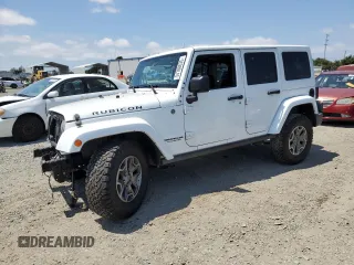 2015 Jeep Wrangler Unlimited Rubicon z VIN 1C4BJWFG6FL508493, wystawiony jako Copart lot #54788635 z przebiegiem 127 694 mil mil oraz Szkoda całkowita • Salvage title. Historia ofert i sprzedaży dostępna na DreamBid. Obrazek 1.