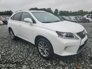 2014 Lexus RX 450h with VIN JTJBC1BA7E2458042, listed as a Copart auction lot 61008905 with 119,368 mi miles and Salvage title. Bid and sale history available at DreamBid. Image 4.