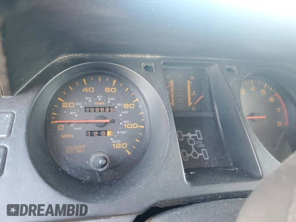 1995 Mitsubishi Montero z VIN JA4MR41H3SJ004800, wystawiony jako Copart lot #72036354 z przebiegiem 209 635 mil mil oraz Szkoda całkowita • Salvage title. Historia ofert i sprzedaży dostępna na DreamBid. Obrazek 9.