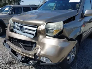 2006 Honda Pilot EX-L with VIN 2HKYF18566H561371, listed as a IAAI auction lot 41950296 with 145,579 mi miles and . Bid and sale history available at DreamBid. Image 6.
