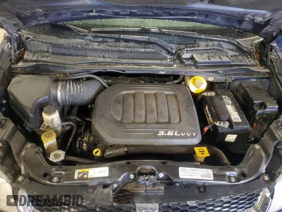 2016 Dodge Grand Caravan SXT with VIN 2C4RDGCG6GR216884, listed as a Copart auction lot 46975405 with 241,750 mi miles and Salvage Title. Bid and sale history available at DreamBid. Image 12.