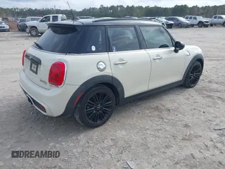2017 MINI Hardtop 4 Door Cooper S z VIN WMWXU3C54H2D32602, wystawiony jako IAAI lot #41458333 z przebiegiem 124 235 mil mil oraz . Historia ofert i sprzedaży dostępna na DreamBid. Obrazek 4.