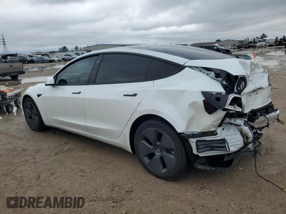 2022 Tesla Model 3 Long Range with VIN 5YJ3E1EB2NF201275, listed as a Copart auction lot 88024985 with 43,540 mi miles and Salvage Title. Bid and sale history available at DreamBid. Image 2.