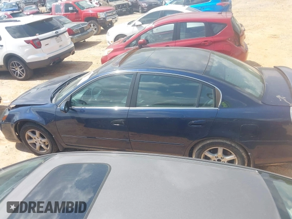 2006 Nissan Altima SE with VIN 1N4BL11D86N365762, listed as a IAAI auction lot 42275034 with 212,759 mi miles and . Bid and sale history available at DreamBid. Image 14.